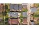 Aerial view of houses and backyards with well-maintained lawns, patios, and residential charm at 1840 S Grant St, Denver, CO 80210