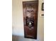Charming antique telephone and decor cabinet add a touch of vintage elegance to the home's unique character at 1840 S Grant St, Denver, CO 80210