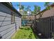 Cozy backyard with a hammock, small lawn, and a wooden fence creating a private outdoor space at 1840 S Grant St, Denver, CO 80210