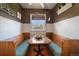 Cozy breakfast nook featuring built-in benches and a table, bathed in natural light with street view at 1840 S Grant St, Denver, CO 80210