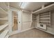 Spacious walk-in closet with ample shelving and storage options at 1840 S Grant St, Denver, CO 80210