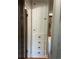 A vintage built-in hall cabinet with drawers and door provides extra storage at 1840 S Grant St, Denver, CO 80210