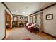 Inviting living room featuring a charming fireplace, hardwood floors, and ample natural light, creating a cozy atmosphere at 1840 S Grant St, Denver, CO 80210