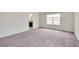 Bedroom featuring carpet and a window with natural light at 12777 Clearview St, Firestone, CO 80504
