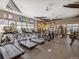 Well-equipped gym with treadmills, ellipticals, and TVs for an enjoyable workout experience at 12777 Clearview St, Firestone, CO 80504