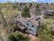 Aerial view of home with backyard deck overlooking landscaped yard in a serene neighborhood at 7888 S Magnolia Way, Centennial, CO 80112