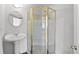 Bathroom featuring vintage shower with glass enclosure, sink, and modern fixtures at 7888 S Magnolia Way, Centennial, CO 80112