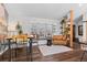 Comfortable dining area features a window seat, stylish furnishings, and natural light, perfect for Gathering gatherings at 7888 S Magnolia Way, Centennial, CO 80112