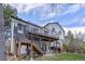 A multi-level deck and patio, perfect for outdoor living and entertaining at 7888 S Magnolia Way, Centennial, CO 80112