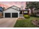 Charming home boasting a well-manicured lawn and a two-car garage, perfectly blending comfort and curb appeal at 7888 S Magnolia Way, Centennial, CO 80112