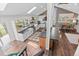 Open kitchen with island, skylight, and stylish decor elements creating a modern design at 7888 S Magnolia Way, Centennial, CO 80112