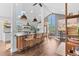 Spacious kitchen with a large island, pendant lighting, and modern finishes creates an inviting atmosphere at 7888 S Magnolia Way, Centennial, CO 80112