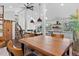 Open floor plan with kitchen and dining area features natural light and modern design, perfect for entertaining at 7888 S Magnolia Way, Centennial, CO 80112