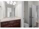 Simple bathroom featuring a single vanity, toilet, and a neutral color palette at 1150 Maddox Ct, Broomfield, CO 80023