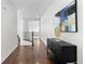Hallway area with neutral decor and wood flooring at 1150 Maddox Ct, Broomfield, CO 80023