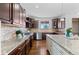 Well-equipped kitchen with granite countertops, stainless steel appliances, and ample cabinet space at 1150 Maddox Ct, Broomfield, CO 80023