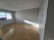 The bright living room features wood floors and lots of natural light at 6009 Yarrow St # C, Arvada, CO 80004