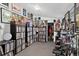 Unique hobby room showcases a large record collection, drum set, and band memorabilia, offering an inspiring creative space at 1448 Depew St, Lakewood, CO 80214