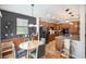 Kitchen boasts a breakfast nook, stainless steel appliances, and gray countertops at 6092 S Ouray St, Aurora, CO 80016