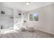 Bright bedroom featuring built-in shelving at 10359 Tracewood Dr, Highlands Ranch, CO 80130