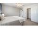 Spacious bedroom featuring a closet with sliding doors and neutral paint at 10359 Tracewood Dr, Highlands Ranch, CO 80130