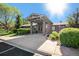 Community clubhouse entrance featuring a covered entryway and well-maintained landscaping for a welcoming experience at 10359 Tracewood Dr, Highlands Ranch, CO 80130