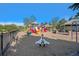 Community playground featuring colorful slides, climbing structures, and picnic area, perfect for Gathering fun at 10359 Tracewood Dr, Highlands Ranch, CO 80130