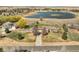Aerial view of this sprawling estate, complete with lake views and lush landscaping at 212 Mulligan Lake Dr, Mead, CO 80542
