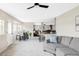 Open concept living area flows from the kitchen and dining room to the comfortable living room at 212 Mulligan Lake Dr, Mead, CO 80542