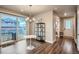 Cozy dining area with sliding glass doors that provides access to the exterior and plenty of natural light at 9786 Rosalee Peak St, Littleton, CO 80125