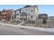 Charming two-story home with landscaped front yard, stone accents, and welcoming porch at 9786 Rosalee Peak St, Littleton, CO 80125