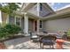Cozy backyard patio with inviting outdoor furniture and a well-maintained lawn, great for relaxation and gatherings at 3354 Wabash St, Denver, CO 80238