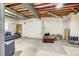 Unfinished basement space with exposed ceiling, ready for customization and potential expansion at 3354 Wabash St, Denver, CO 80238