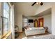 Bedroom features vaulted ceilings, lots of natural light and a closet with wood trim at 3354 Wabash St, Denver, CO 80238