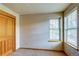 Bedroom with a closet, neutral walls, carpet, and two windows for lots of natural light at 3354 Wabash St, Denver, CO 80238