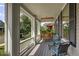 Inviting front porch with a swing, chairs, and a view of the neighborhood at 3354 Wabash St, Denver, CO 80238