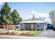 Inviting single-Gathering home with beautiful lawn, mature trees, and private driveway at 1794 Xenia St, Denver, CO 80220