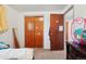 Bedroom features carpet flooring and closet space at 12734 Anhawa Ave, Longmont, CO 80503