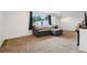 The living room features carpet flooring at 12734 Anhawa Ave, Longmont, CO 80503