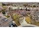 Beautiful aerial view of home with lush landscaping, and a large driveway at 11254 Oakland Dr, Commerce City, CO 80640