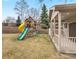 Beautiful backyard featuring a play structure, shed, and a well-maintained lawn, great for recreation at 11254 Oakland Dr, Commerce City, CO 80640