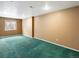 Finished basement with a window for natural light and plenty of space at 11254 Oakland Dr, Commerce City, CO 80640