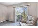 Cozy sitting area with a large window offering natural light at 3295 S Estes St, Lakewood, CO 80227