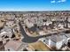 Wide aerial shot displaying the neighborhood layout and the surrounding landscape at 22647 Hopewell Ave, Parker, CO 80138