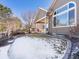 Beautiful backyard view featuring a covered patio and lush landscaping, ideal for outdoor living and entertaining at 22647 Hopewell Ave, Parker, CO 80138