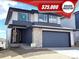 Beautiful home featuring a two-car garage, stylish stone accents, and a covered entry at 4888 Noris Ave, Morrison, CO 80465