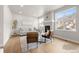 Inviting living room with large windows offering scenic views and comfortable seating at 4888 Noris Ave, Morrison, CO 80465