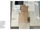 Various samples of flooring, backsplash, and cabinet colors, offering modern design options at 4888 Noris Ave, Morrison, CO 80465