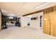 The basement features a waterfall wall art, and wood paneling at 13123 Spica Dr, Lone Tree, CO 80124