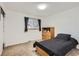 This bedroom features dark curtains, carpeted floors, and wooden drawers at 13123 Spica Dr, Lone Tree, CO 80124
